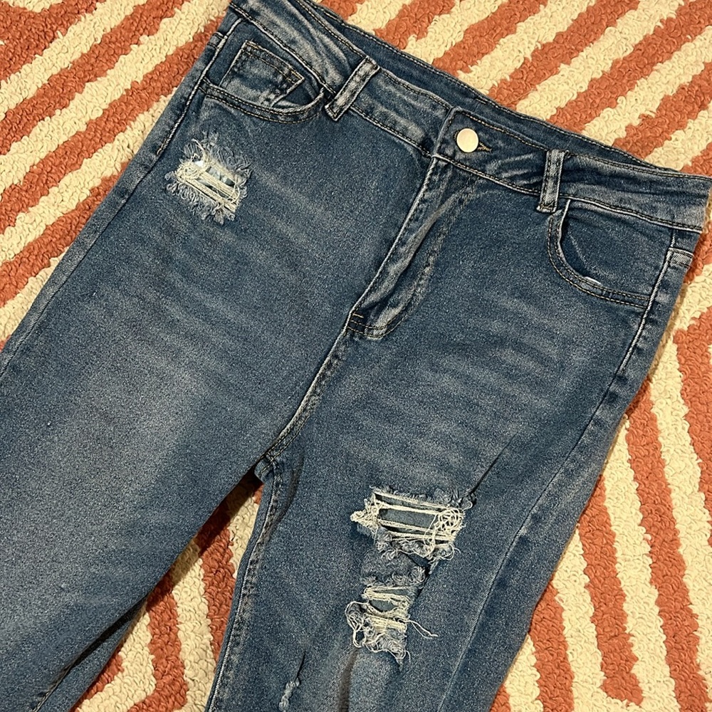 NWOT! Stretchy Jeans with LOTS of Ripped Detail